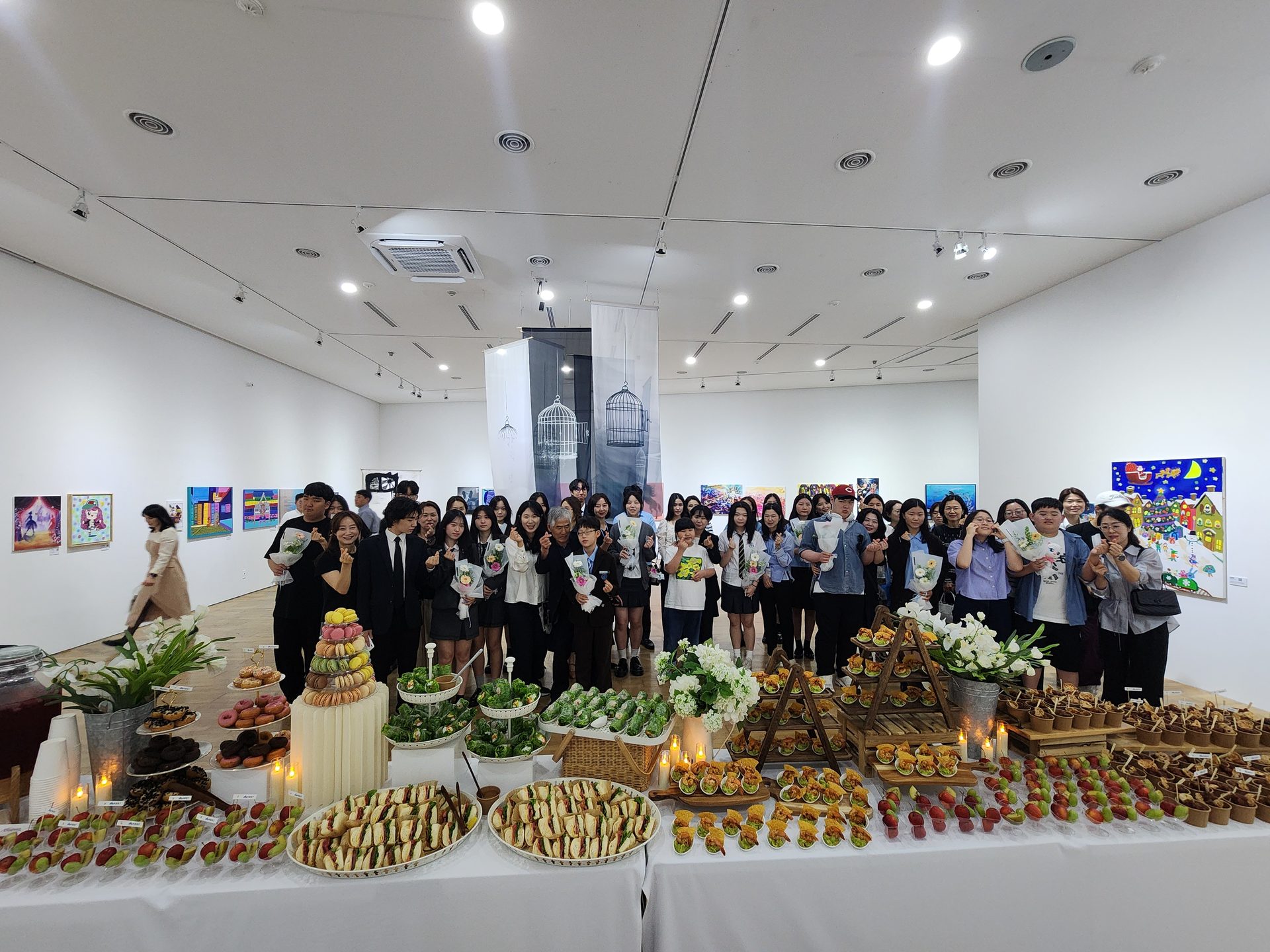 ABST exhibition visitors viewing artwork